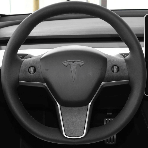 Tesla Model 3/Y steering wheel showcasing premium suede cover for enhanced grip and comfort.