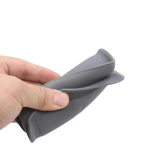 Flexible grey silicone console protector for Tesla, offering durability and style for vehicle interiors.