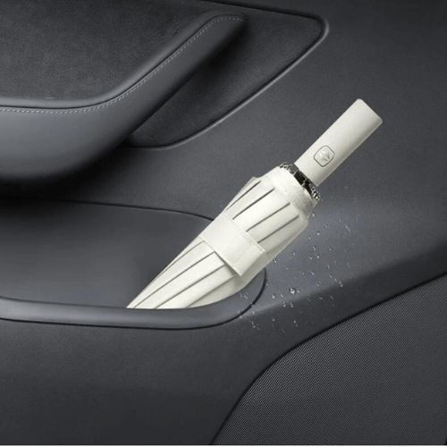Tesla door pocket with a stylish umbrella, showcasing premium design and waterproof features.