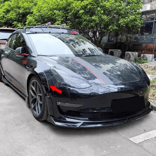 Tesla Model 3 with a Turbo body kit, showcasing a sleek design and enhanced aerodynamics.