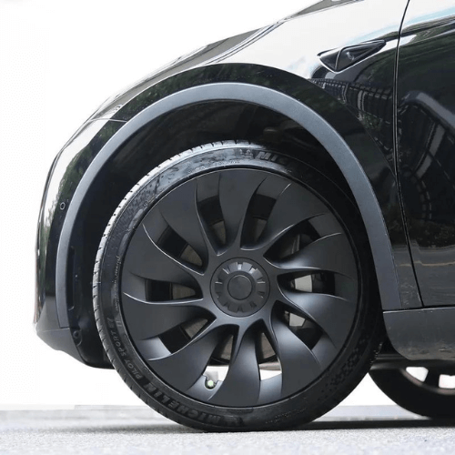 Enjoliveur 20 pouces noir sur une Tesla Model Y, associant style moderne et durabilité.