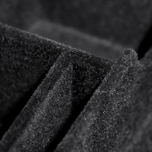 Textured black fabric detail of an interior organizer designed for Tesla vehicles.