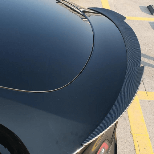 High-quality carbon fiber spoiler for Tesla Model 3, enhancing aerodynamics and aesthetics.