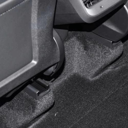 Espace de rangement arrière de voiture, conçu pour l'organisation et le stockage efficace des passagers dans un véhicule électrique.