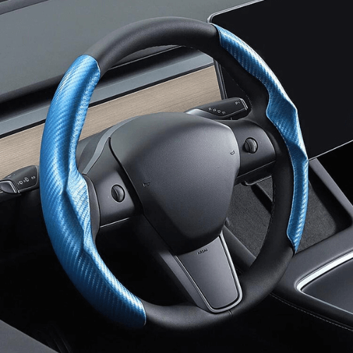 Couvre volant bleu en suédine pour Tesla, alliant confort, style et design ergonomique.