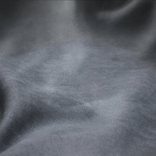 Luxurious suede fabric texture showcasing softness and elegance for steering wheel covers.