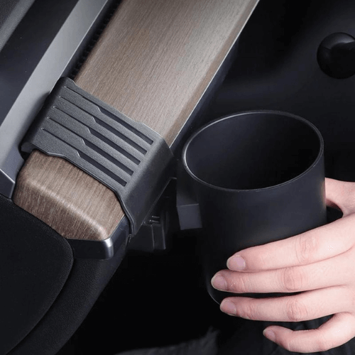 Stylish cup holder for Tesla, showcasing ease of use and modern design with functional integration.