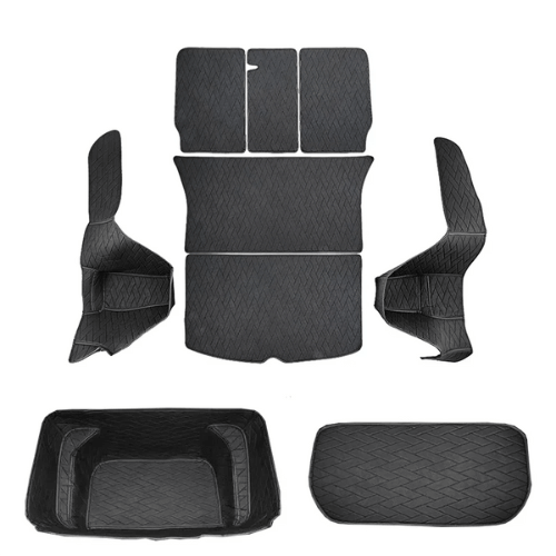 Tapis de coffre Tesla en noir, offrant protection et style pour l'espace de chargement.