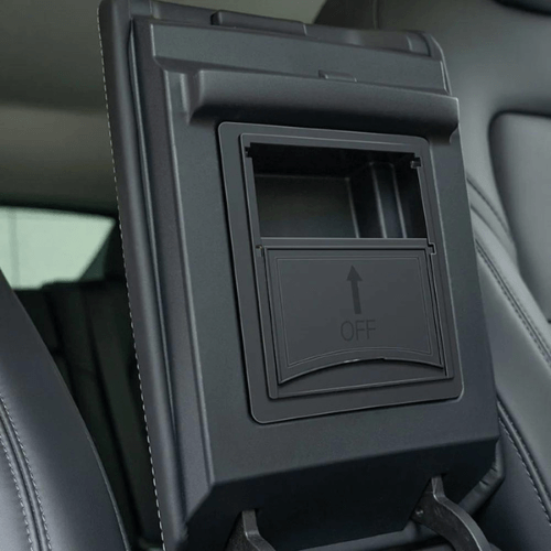 Organisateur intérieur Tesla avec compartiment dépliable pour un rangement optimisé et sans désordre.