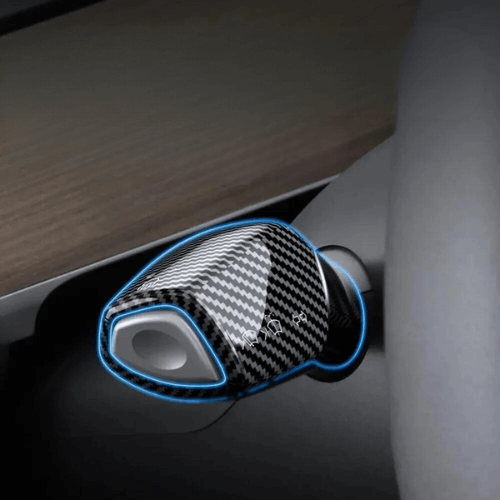 Covering de commodos pour volant Tesla en carbone offrant style et protection contre l'usure quotidienne.