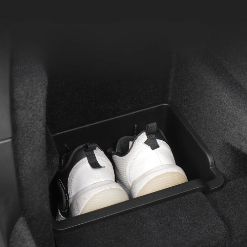 Bac de rangement coffre Tesla avec compartiment pour chaussures blanches, offrant une organisation efficace.
