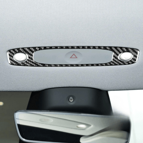 Covering plafonnier in carbon fiber design for Tesla central console, enhancing style and protection.