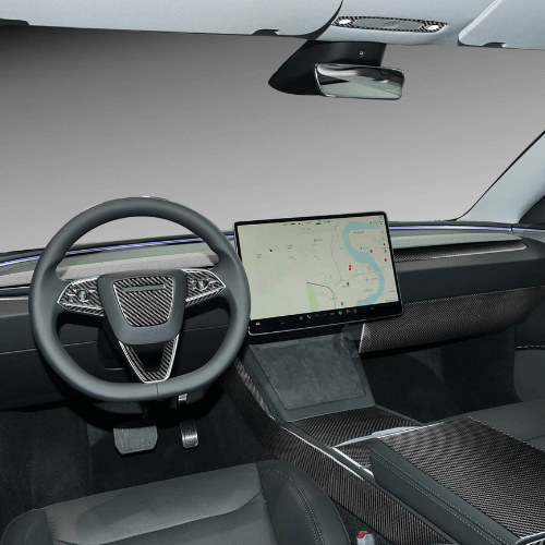 Tesla interior showcasing high-end central console covering and modern dashboard design.