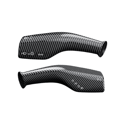 Covering de commodos en carbone pour volant Tesla, ajoutant protection et style à l'intérieur.