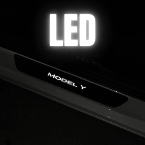 Seuil de portière rétroéclairé LED pour Tesla Model Y, ajoutant un style luxueux à l'entrée du véhicule.