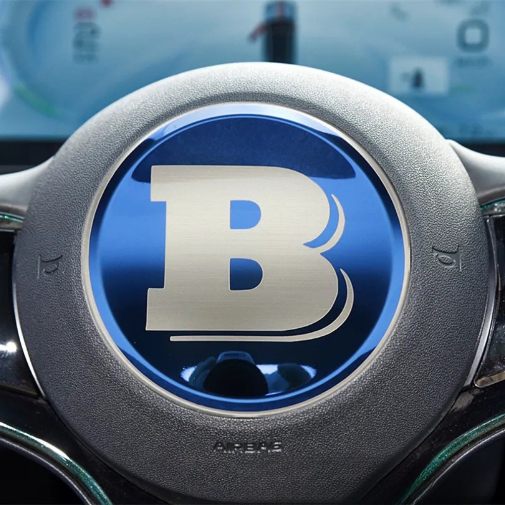 Emblème de volant BYD en inox, finition premium, ajoutant style au volant de véhicules BYD.