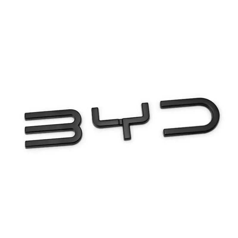 Emblèmes métalliques BYD en noir pour personnaliser votre véhicule électrique avec style.
