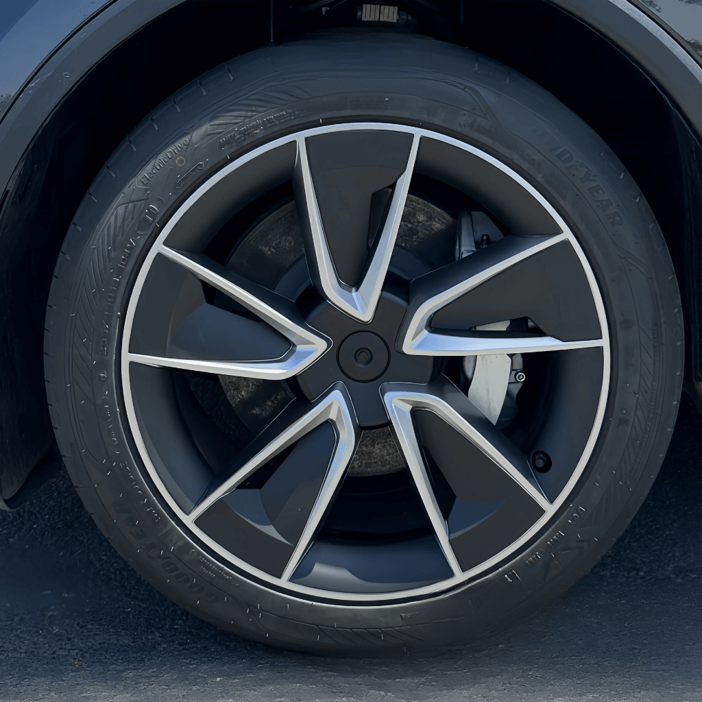 Enjoliveur 19 pouces pour Tesla Model Y, design élégant, roue de haute qualité pour style et protection.