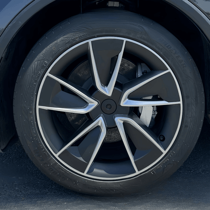 Enjoliveur 19 pouces pour Tesla Model Y, design élégant, roue de haute qualité pour style et protection.