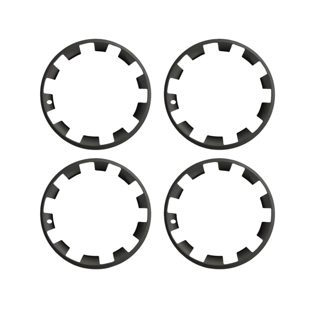 Set of four 20-inch black wheel covers for Tesla Model Y, designed to protect and enhance wheel aesthetics.