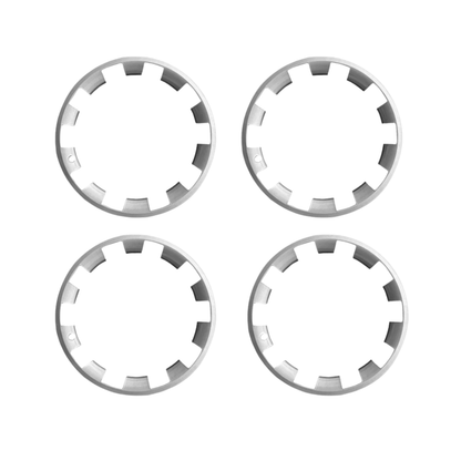 Set of four silver wheel covers for enhancing Tesla Model Y appearance and protecting rims.