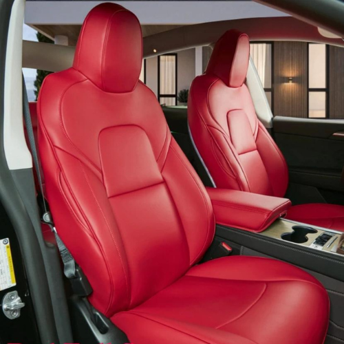 Red faux leather car seat covers installed on front seats, showcasing stylish design and protection against wear and stains.