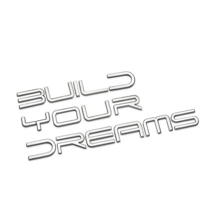 Metallic letters spelling 'Build Your Dreams' for vehicle customization and personalization.