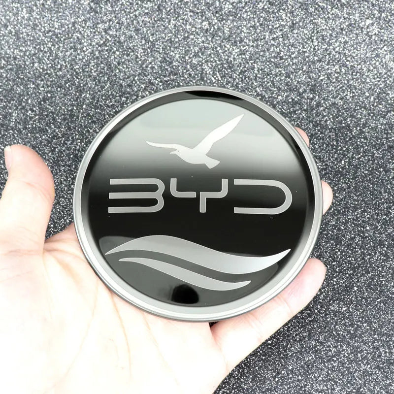 Emblème de volant BYD en inox, élégant et moderne, parfait pour personnaliser votre véhicule électrique.
